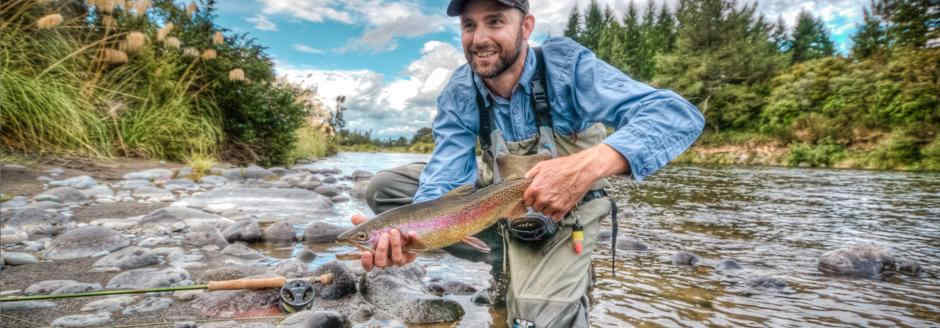 Man holding fish in his hands