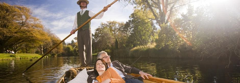 boat sailing in lake - christchurch
