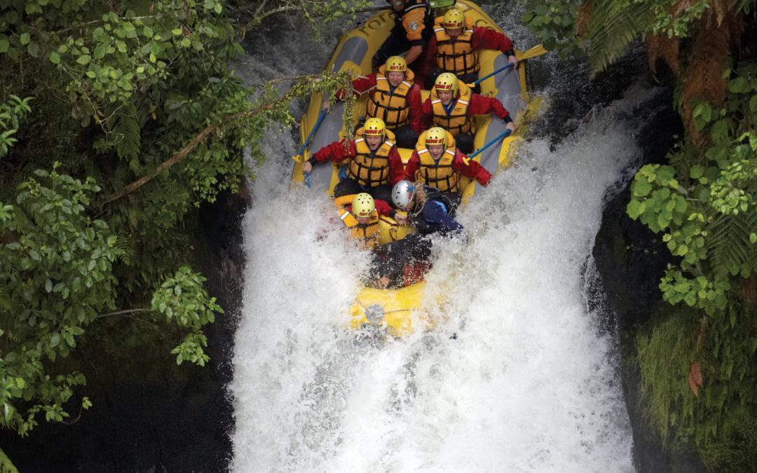 Rafting the 7 metre Tutea falls on the Kaituna River, Rotorua, New Zealand